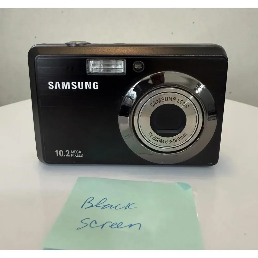 Samsung ES55 Digital Camera 10.2MP Compact Point & Shoot BLK SPOT On Screen.